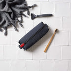 TOOLETRIES The Koby Mini Kit - Silicone Toiletry Organizer, Bathroom Travel Bag - Features Heavy-Duty Zipper, Leak Resistance, Easy to Clean - Charcoal